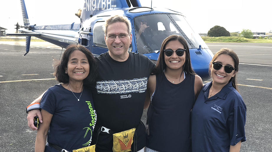 Family getting ready for a helicopter ride to the volcano