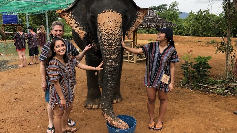 Bob, Diana, and Marcy hanging out with their elephant friend