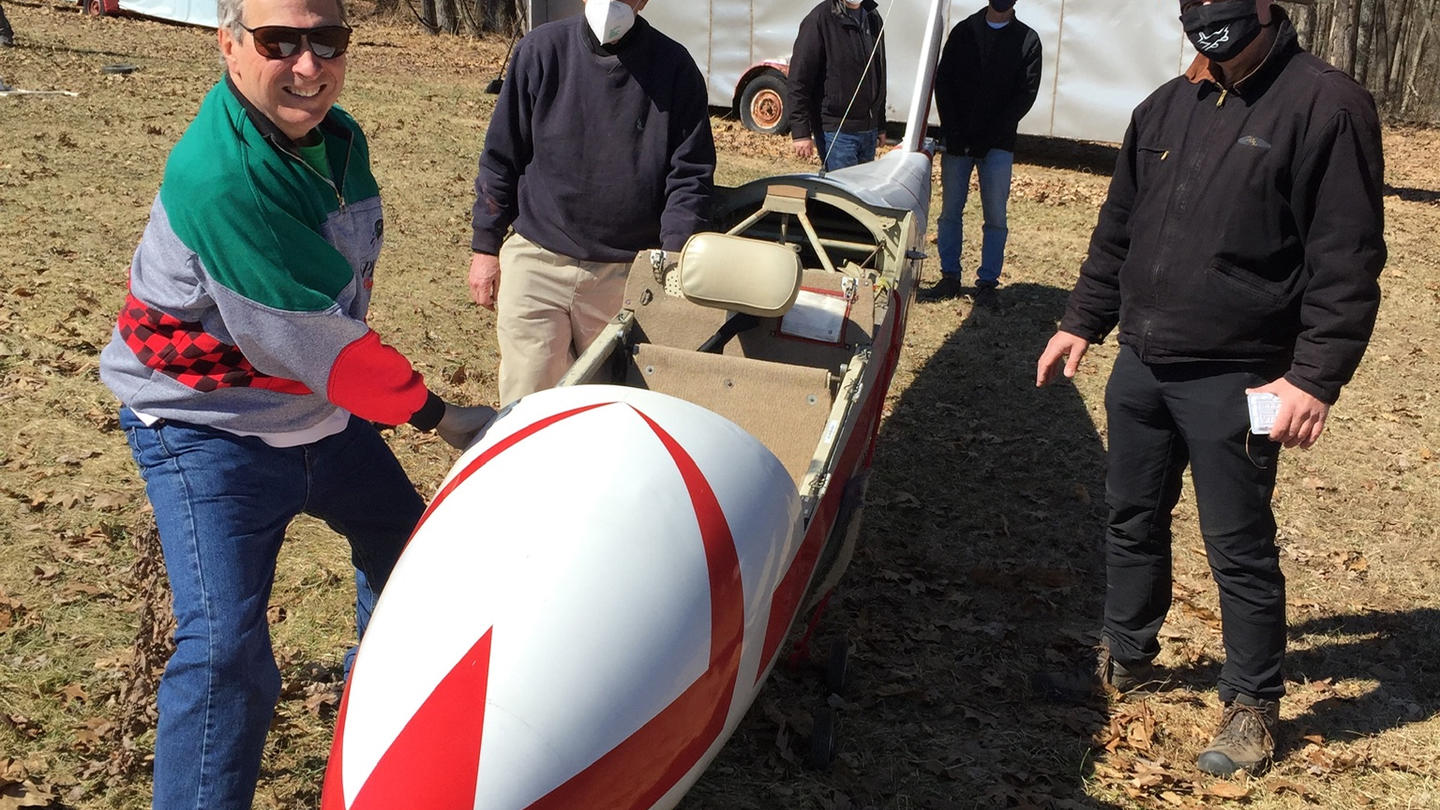 Soaring Tigers club members preparing glider to fly.